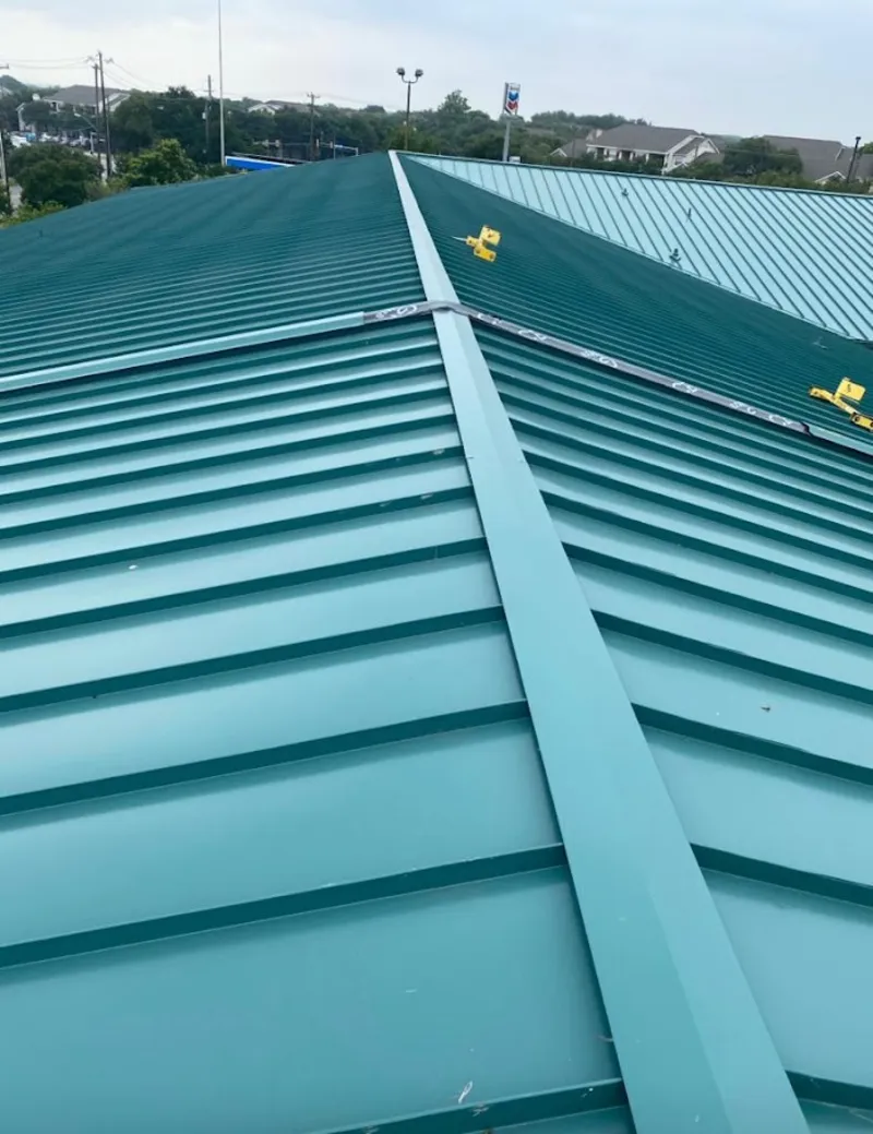 Green commercial metal roof ridge and valley for Metal Roof Repair in Farmville
